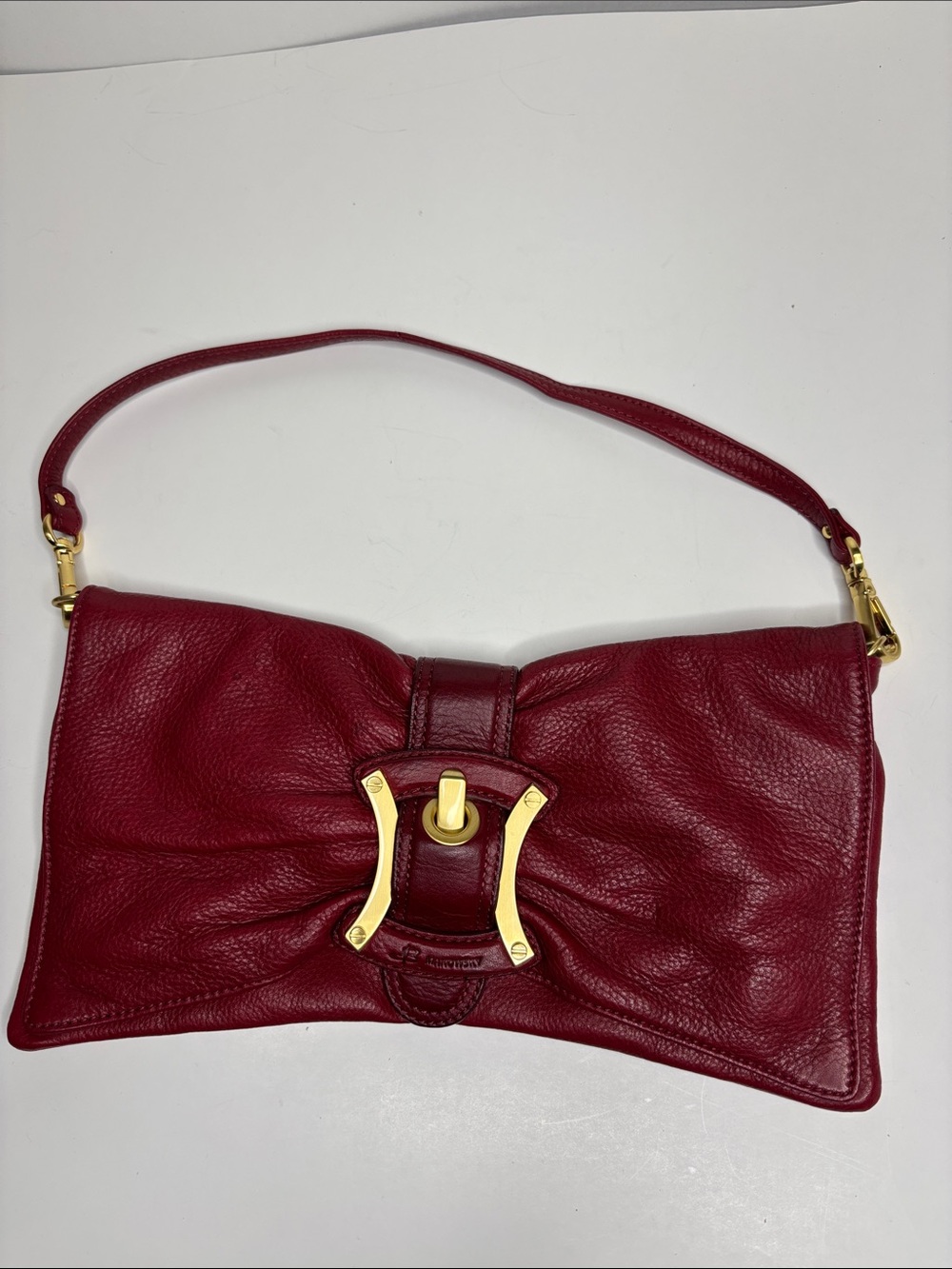 b. makowsky Burgundy Leather Clutch with Gold-Tone Turnlock